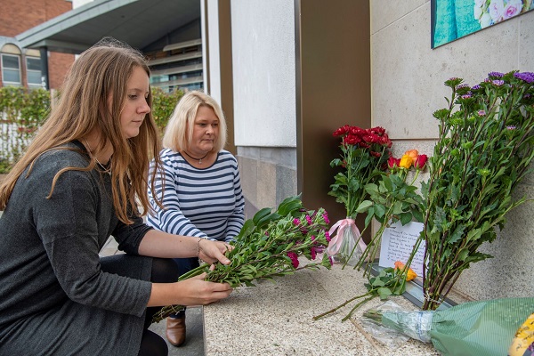 Public laying floral tributes