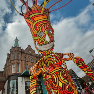 Giant puppet at city festival
