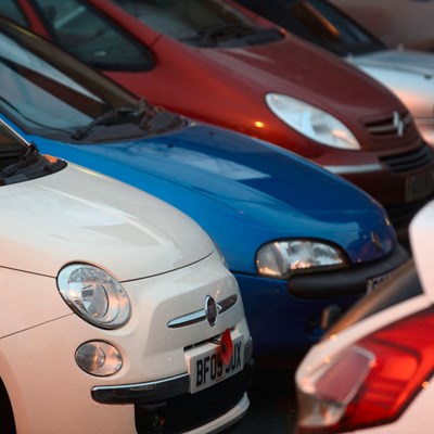 A stock image of parked cars