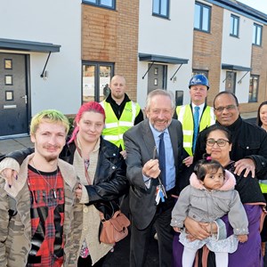 City Mayor Peter Soulsby and residents of Mildand Heart's new affordable homes at Ashton Green