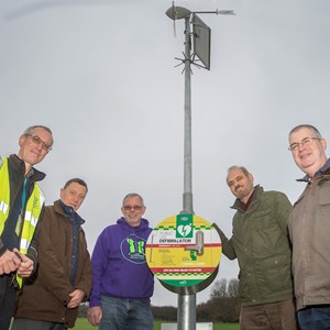 Image: Left to right: Stefan Cabaniuk and Steve Palethorpe from Leicester City Council with Mike Ferguson from JHMT, Councillor Piara Singh Clair and Alan Harrison-White from JHMT with the new solar and wind-powered defibrillator at Castle Hill Country Park