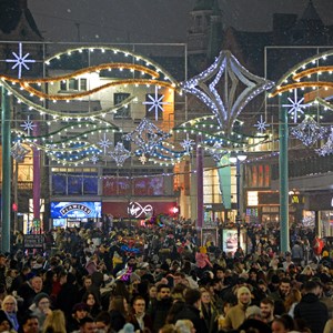 Gallowtree Gate crowds with Christmas lights overhead