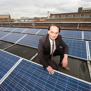 Cllr Adam Clarke with solar panels
