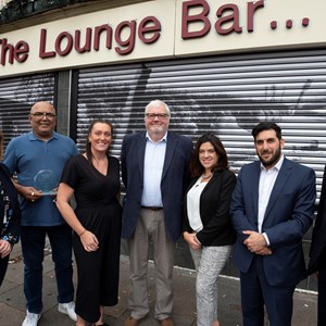 Image shows council staff, business owners, city mayor Peter Soulsby (right) and Cllr Kirk Master in Saffron Lane