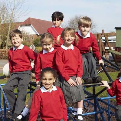 A picture of some primary school children in uniform