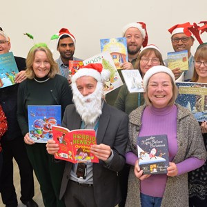 Leicester Libraries staff pictured with some good Christmas reads