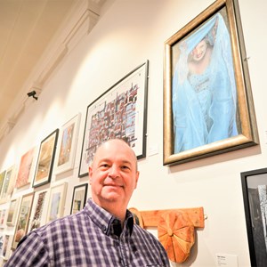 Open exhibition winner with artwork
