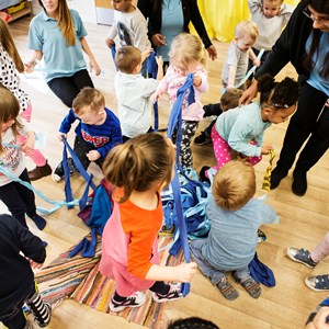Image: Young children taking part in creative play. Photo courtesy of Pamela Raith Photography