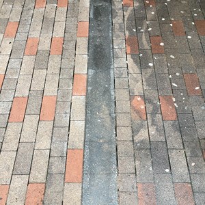 Before and after picture of gum on street