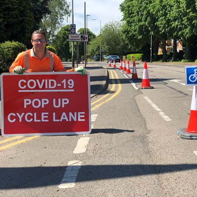 City Highways staff installing pop-up cycle lane at London Road