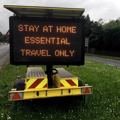 Stay at home road sign