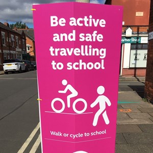 Lamp post banner wth safety information