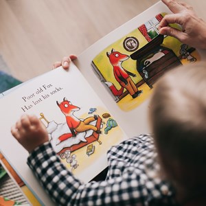 Child looking at a book