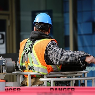 A worker in a hi-vis jacket