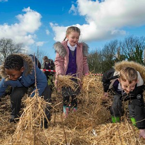 Children planting trees at Queensmead