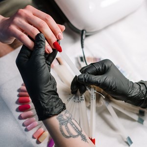 Person getting nail treatment