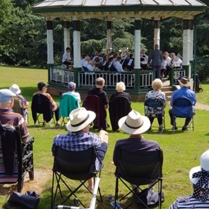 Visitors watching a band perform