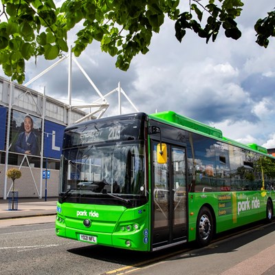 Green Lines Park and Ride bus passing the King Power Stadium