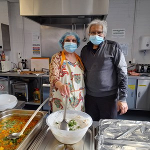 Volunteers in the community kitchen of the Bridge Homelessness to Hopeday centre