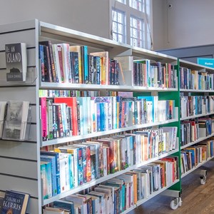 An image of bookshelves at Knighton Library in Leicester