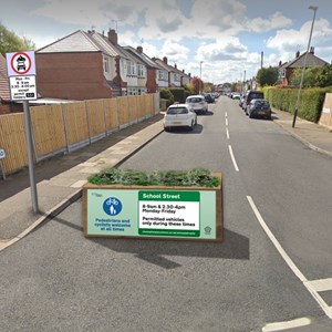 Artists'impression of how one of the streets could look with a planter in place across one side of the carriageway