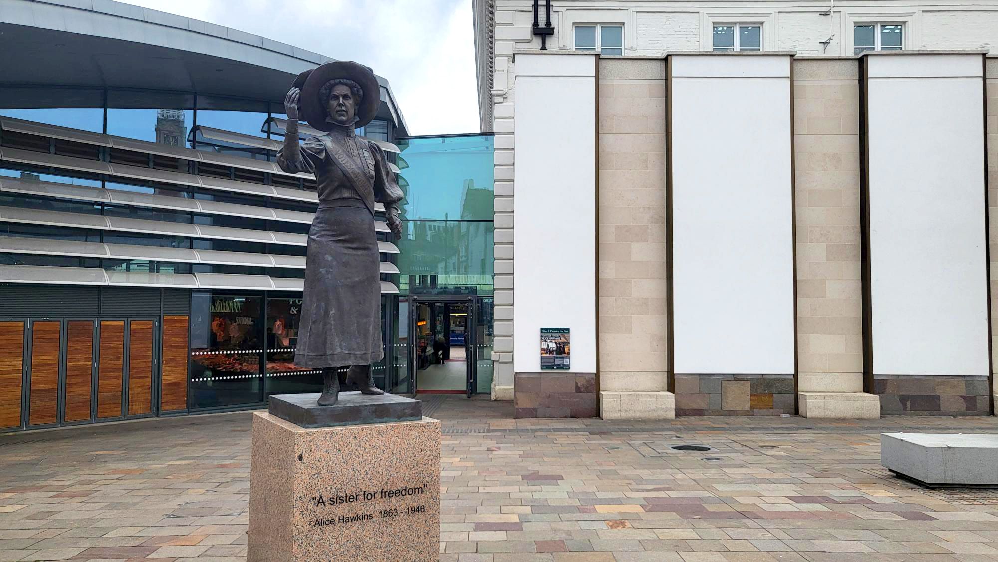 Alice Hawkins statue with Picturing the Past panel in background