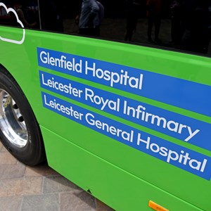 New electric bus with hospitals listed on the side