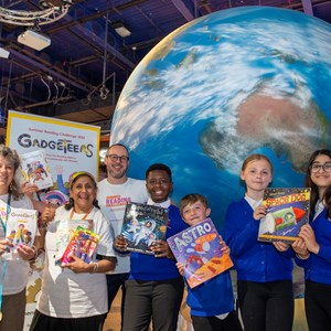 Elaine Grainger-Jarvis, Hema Acharya and Matthew Vaughan from Leicester Libraries at the reading challenge launch with pupils from Marriott Primary School