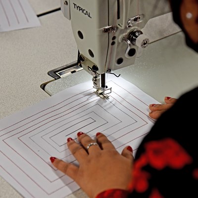 Sewing work being carried out on a machine