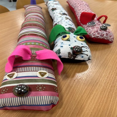 Draught excluders made at a Let's Get Resourceful session in Leicester