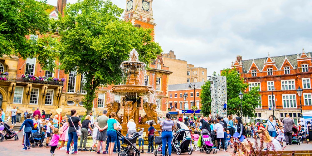 Families with young children take over Town Hall Square for the annual Playday