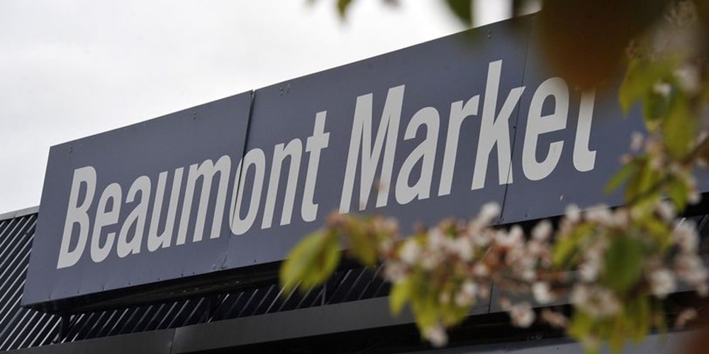 A large sign that says Beaumont Market