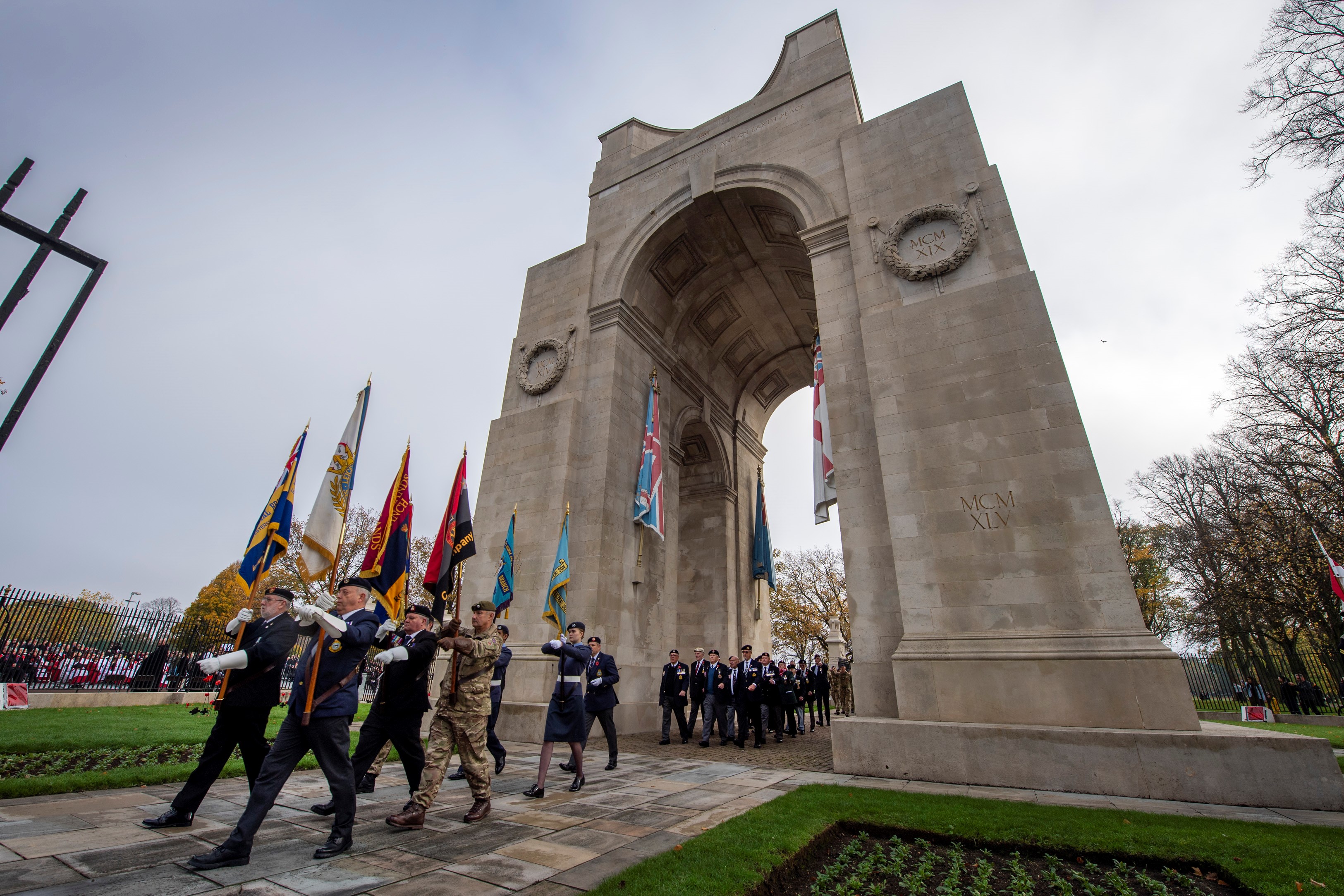 Members of the Armed Forces parading at the Arch of Remembrance in Victoria Park