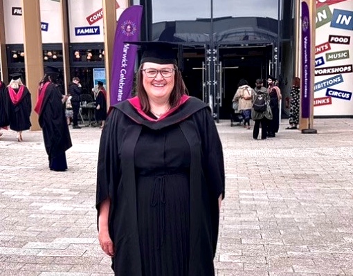 Alex Cadoux at graduation ceremony