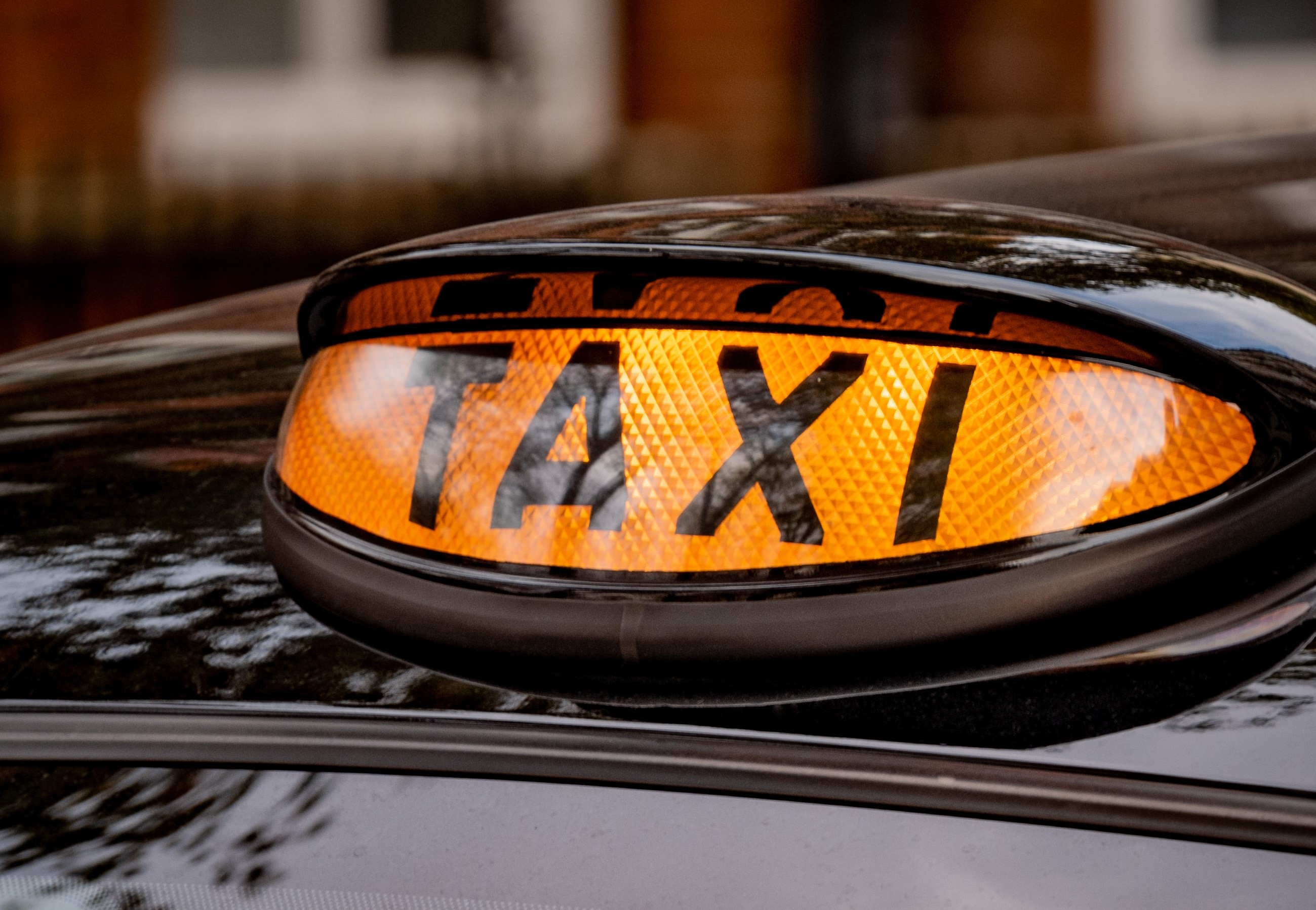 Illuminated taxi sign