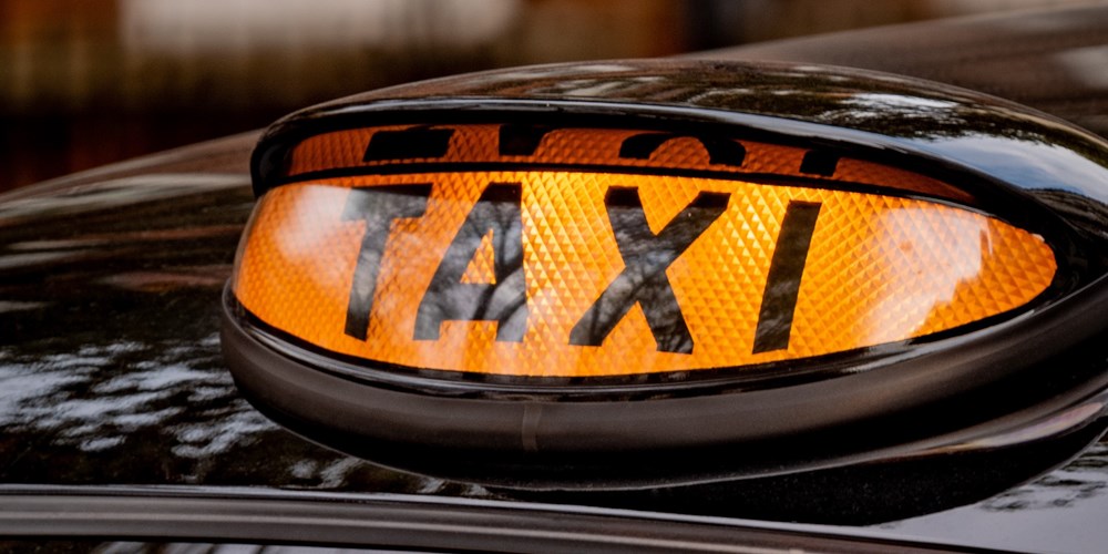 Illuminated taxi sign
