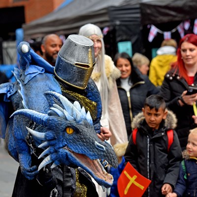 St George and the dragon meet children at a previous St George's Day celebration in Leicester