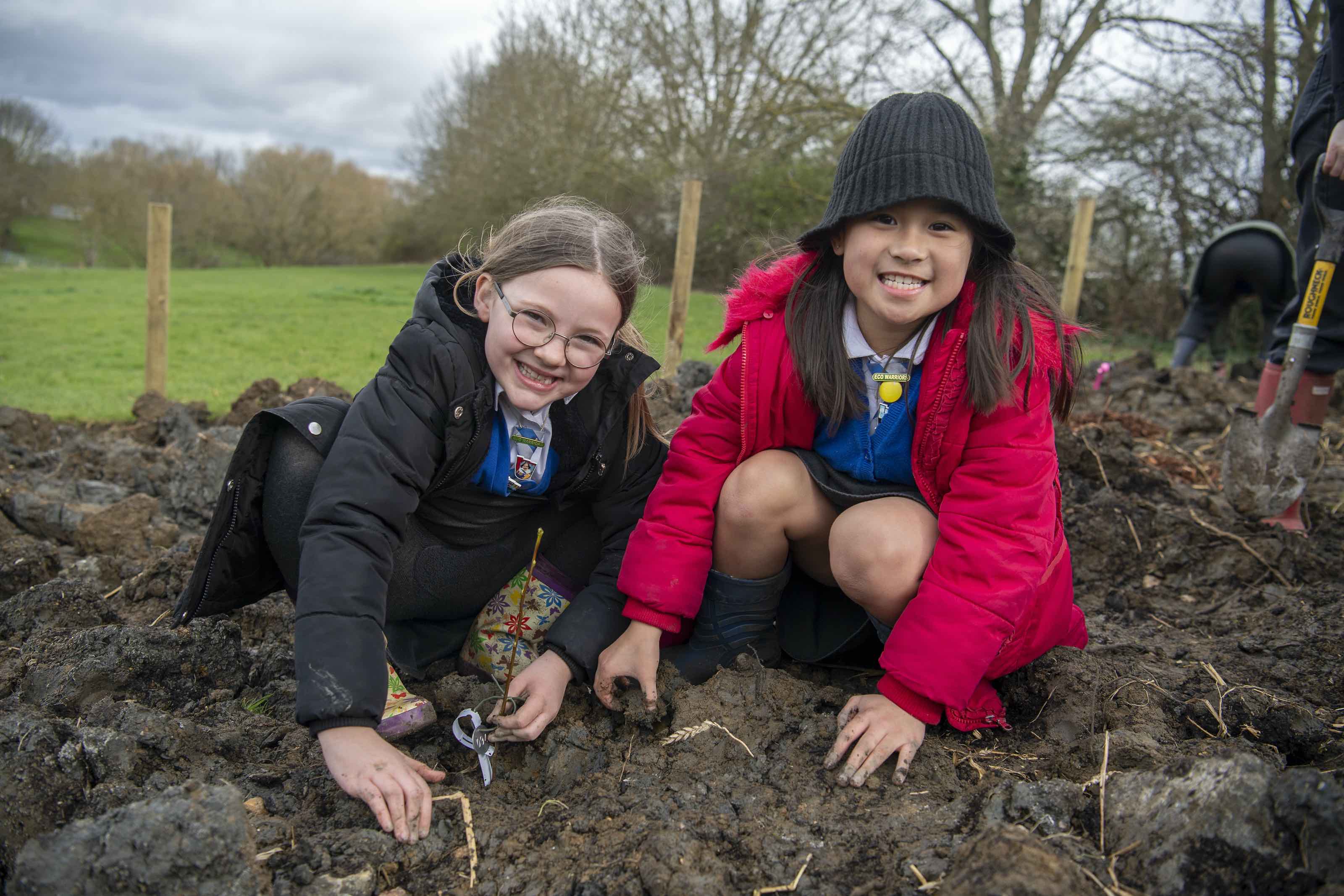 Pupils helping to plant the new Tiny Forest