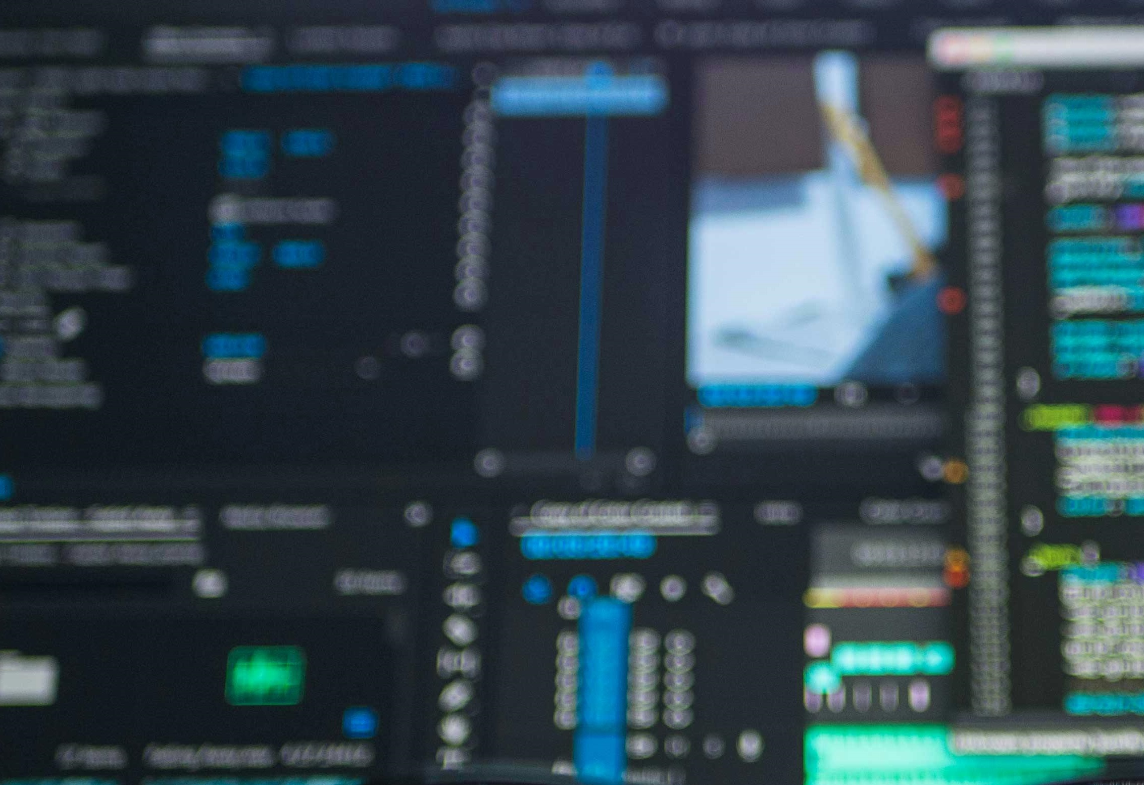 A computer screen with blurred words and graphics on it