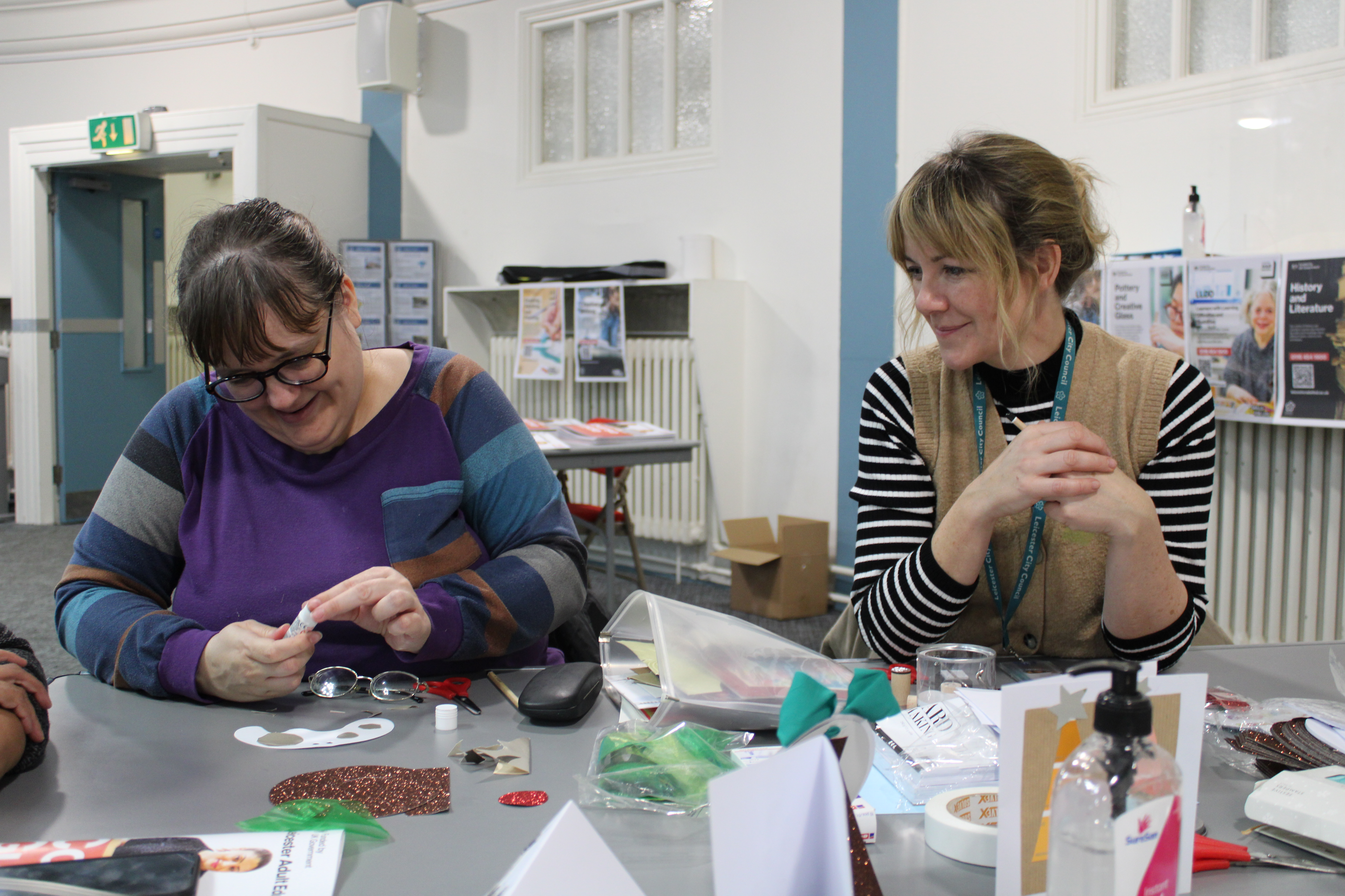 An adult learner with a tutor at Leicester Adult Education College