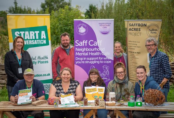 Cllr Sarah Russell (seated, second left) at Saffron Acres - one of Leicester's many mental health-friendly places.