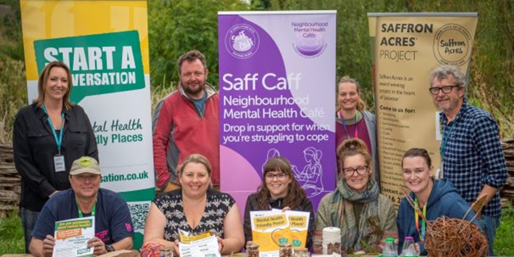 Cllr Sarah Russell (seated, second left) at Saffron Acres - one of Leicester's many mental health-friendly places.
