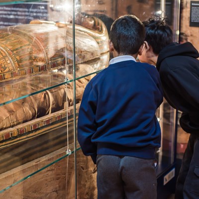 Children examine exhibits in Leicester's Ancient Egypt gallery