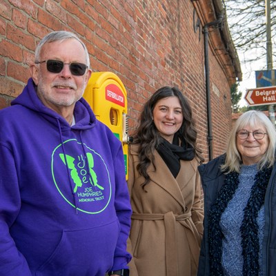 Picture shows l-r Dr Mike Ferguson, Dr Laura French and Cllr Vi Dempster with the new defibrillator