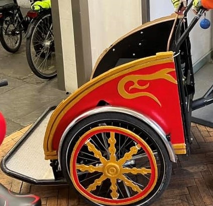 A Ride Leicester rickshaw decorated as a chariot