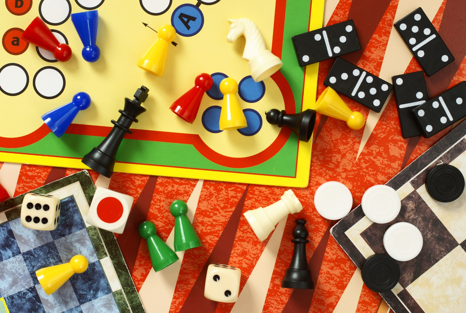 An image showing counters and dice used in board games