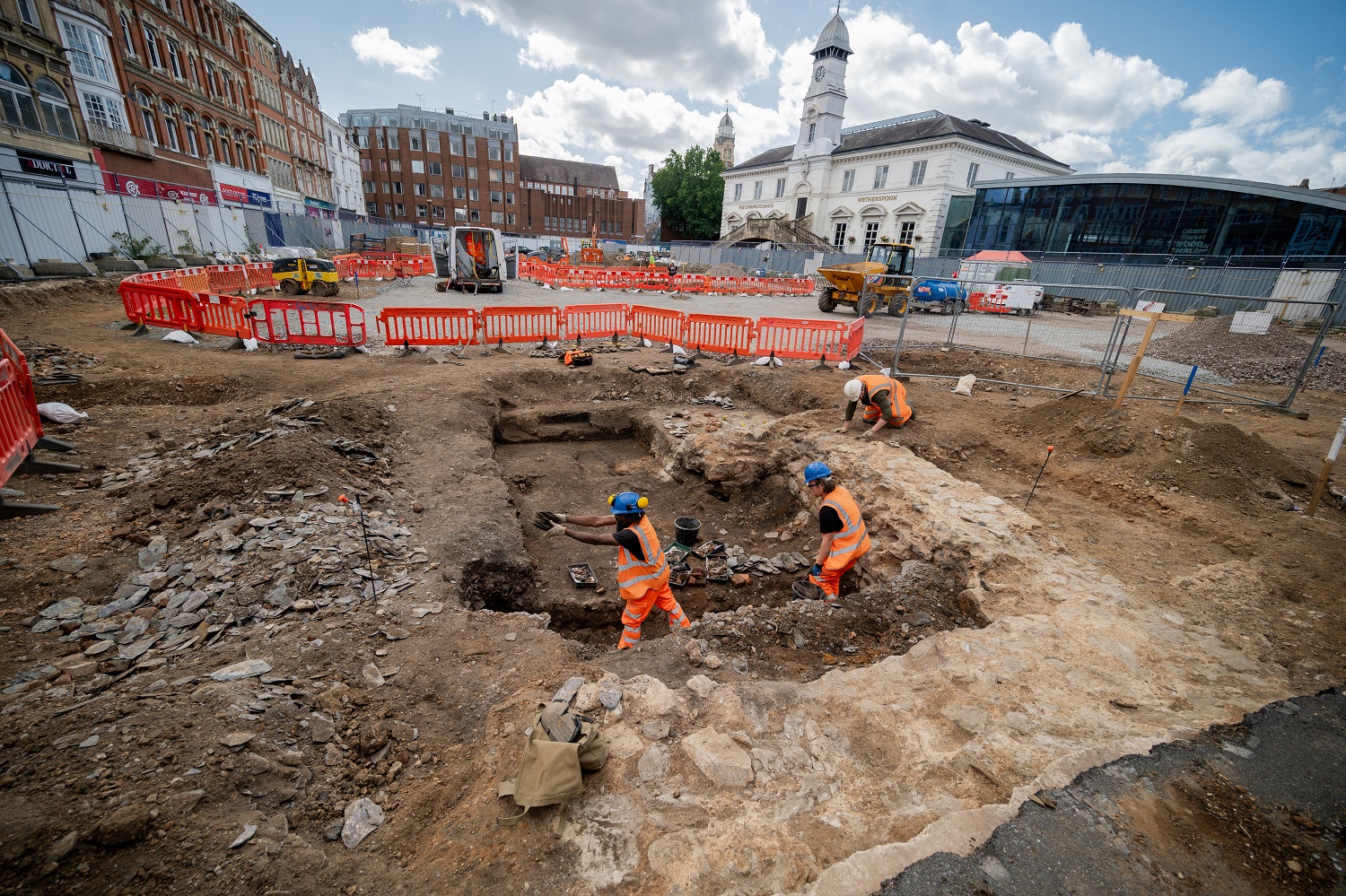 Archaeologists at work on the market site in Leicester