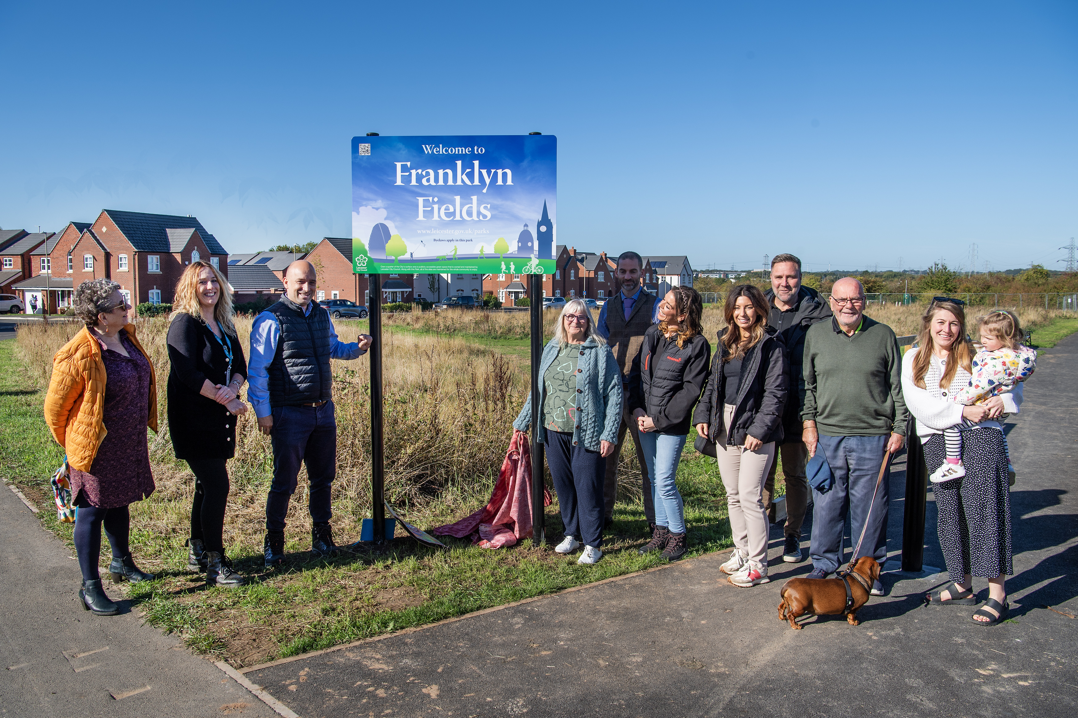 Picture shows Cllr Vi Dempster (centre) unveiling the new sign at Franklyn Fields