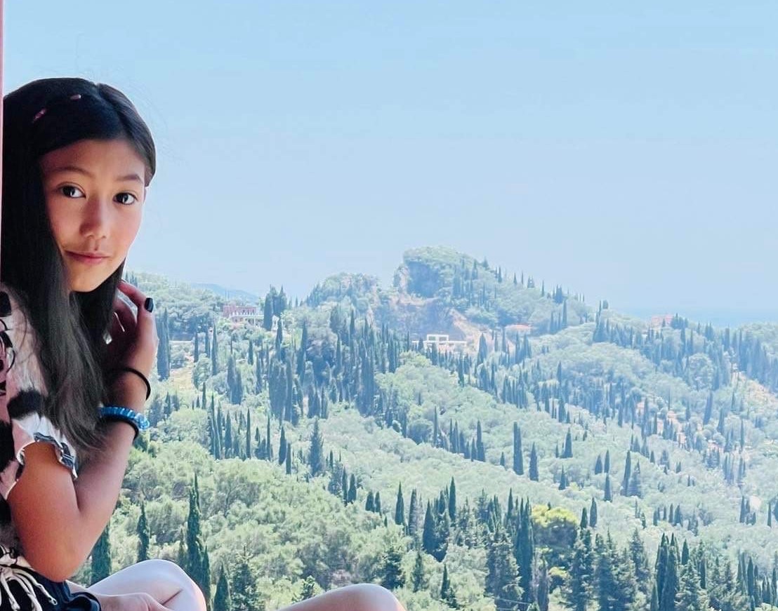 Ayana sitting reading