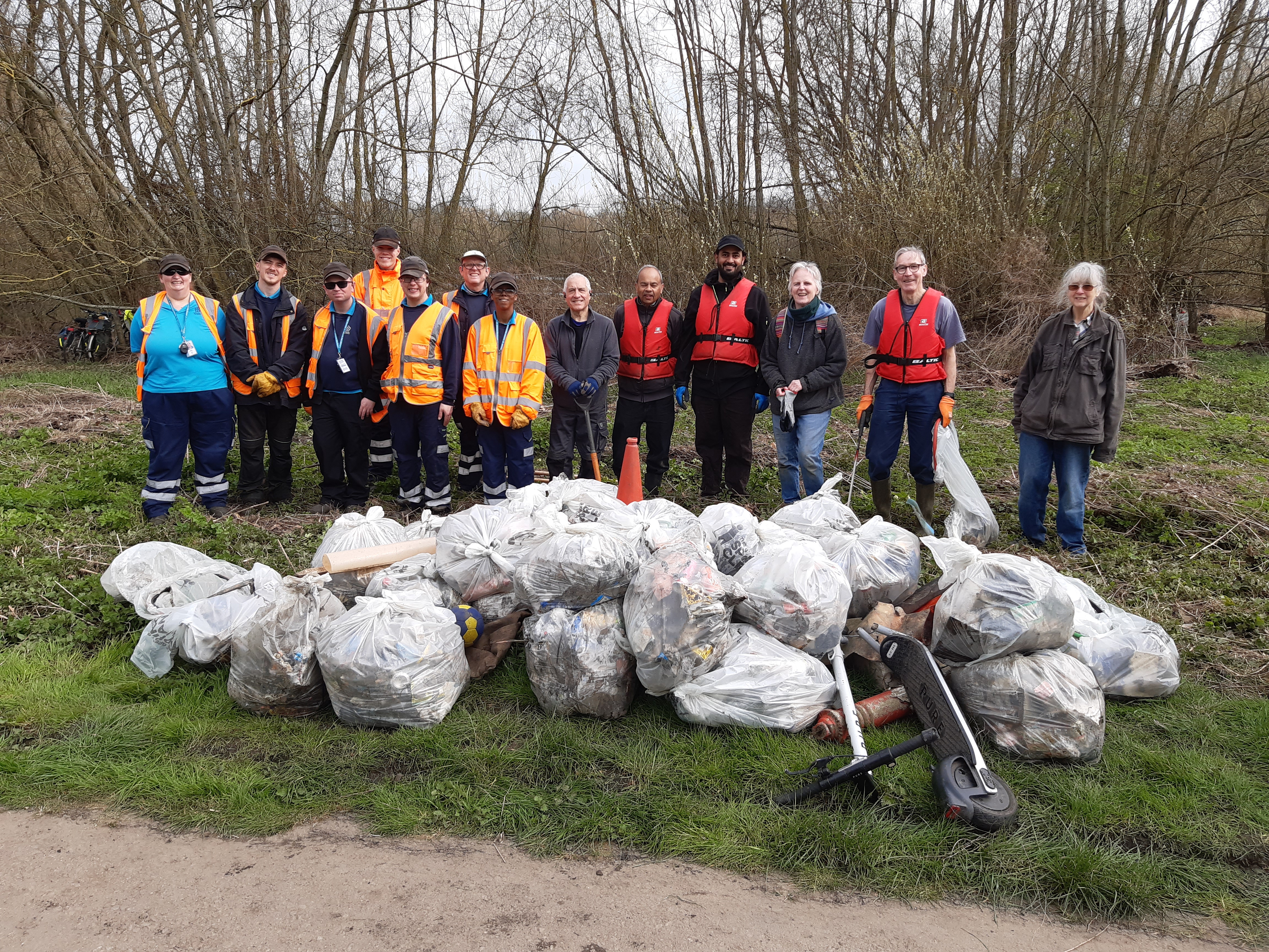 Leicester Environmental volunteers collecting bags of litter in leicester
